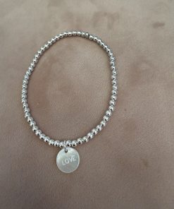 Accueil 33 Bracelet élastique perles en argent 3 mm et médaille nacre au choix , trèfle ou médaille